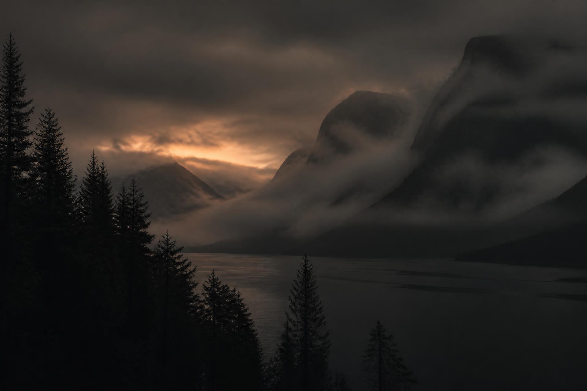 Misty Nordic fjord at dusk